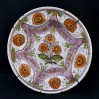 XVIII wieczny fajansowy talerz malowany w kwiaty