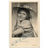 Piękna i młoda Winnie Markus w słomkowym kapeluszu na dawnej fotografii