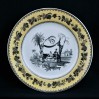 Fajansowy XIX-wieczny talerz z bogatą dekoracją