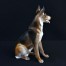Porcelanowa figurka siedzącego psa