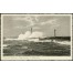 Widok kartki pocztowej przedstawiającej wzburzone morze w Kołobrzegu.