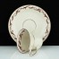 Bordiura geometryczne art deco na porcelanowej filiżance