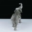 Pięknie i naturalistycznie malwoana figurka dużego słonia z dawnej porcelany