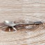 Mała srebrzona łyżeczka kolekcjonerska w typie souvenir spoon.