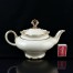 Sympatyczny czajnik do herbaty z porcelany kremowej