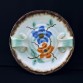 Niebanalna ceramiczna patera z fikuśnymi uszkami i kwiatową malaturą