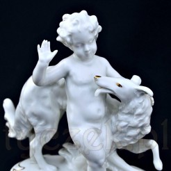 Putto z chartem - oryginalna i cenna porcelanowa figurka