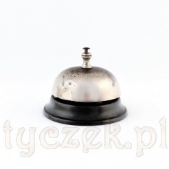 Elegancki dzwonek recepcyjny ze sprawnym mechanizmem dzwonienia.