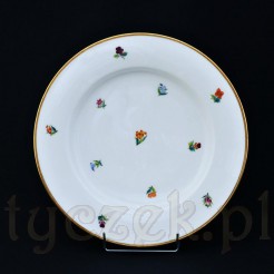 Piękny płytki talerz obiadowy z białej porcelany