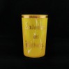 KOLBERG pamiątkowa szklanica z marmurkowego szkła w żółtym odcieniu