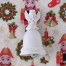 Porcelanowy dzwoneczek z uchwytem figuralnym w kształcie aniołka