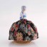 Porcelanowa lalka Half Doll z kwiecistą spódnicą materiałową, idealna do kolekcji antyków