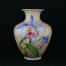 Odkryj niepowtarzalny wazon Rosenthal Cattleya wykonany z porcelany w kolorze écru. Na wazonie widnieje przepiękna kalkomania storczyków podmalowana ręcznie