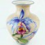 Zobacz wyjątkowy wazon Rosenthal Cattleya z piękną kalkomanią storczyków. To prawdziwa perełka dla miłośników porcelany i kwiatów