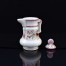 Po jednej stronie widnieje piękna kwitnąca gałąź jabłoni i motylek