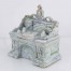 Porcelanowe figuralne puzderko w formie biurka. 