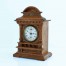 Zdjęcie przedstawiające zegar stołowy z pozytywką i budzikiem Thomas Haller AG 