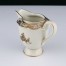 Złote dekoracje wspaniale korespondują z barwą porcelany. 