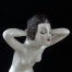 Kobiecy akt - ceramiczna figurka z XX wieku.