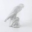 Drapiezny ptak w spoczynku - porcelanowa figurka