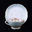 Biało-błękitna porcelanowa filiżanka ze spodkiem
