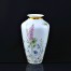Wielobarwne kwiaty polne oraz dwa cudowne motyle na porcelanowym wazonie