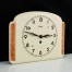 Nakręcany zegar wiszący w ceramicznej obudowie