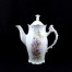 Wysoki dzbanek do kawy lub herbaty ze śnieżnobiałej porcelany