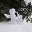 Porcelanowy aniołek gra na saksofonie - muzykujące putto