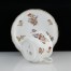 Ciekawy wzór kwiatowy na filiżance i talerzyku z porcelany szlachetnej