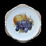 Dojrzała gruszka i winogron na śląskim talerzu Ohme