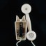 Słuchawka wraz z bazą przyścienna tworzą kompletny aparat domofonowy