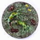 Ceramiczny talerz z jaszczurami i owadami w stylu Palissy wytworzony przez Mafra Caldas w XIX wieku